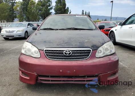 2003 Toyota Corolla Ce z USA, uszkodzony, nr VIN 1NXBR32E63Z147506